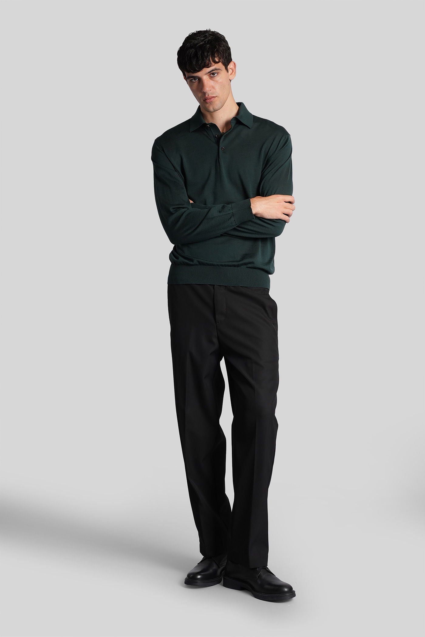 Polo in green wool